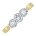 An 18ct gold diamond three-stone ring.Total diamond weight 0.25ct, stamped to band.