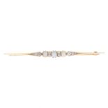 A diamond and cultured pearl bar brooch.Estimated total diamond weight 0.40ct.