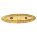 A late Victorian 15ct gold ruby and diamond brooch.Estimated diamond weight 0.15ct,