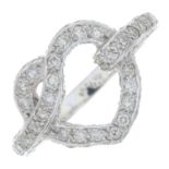 An 18ct gold brilliant-cut diamond openwork heart ring.Estimated total diamond weight