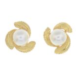 A pair of cultured pearl floral stud earrings, by Mikimoto.Maker's marks for Mikimoto.