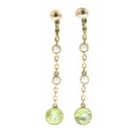 A pair of peridot and split pearl drop earrings.Stamped 15CT.