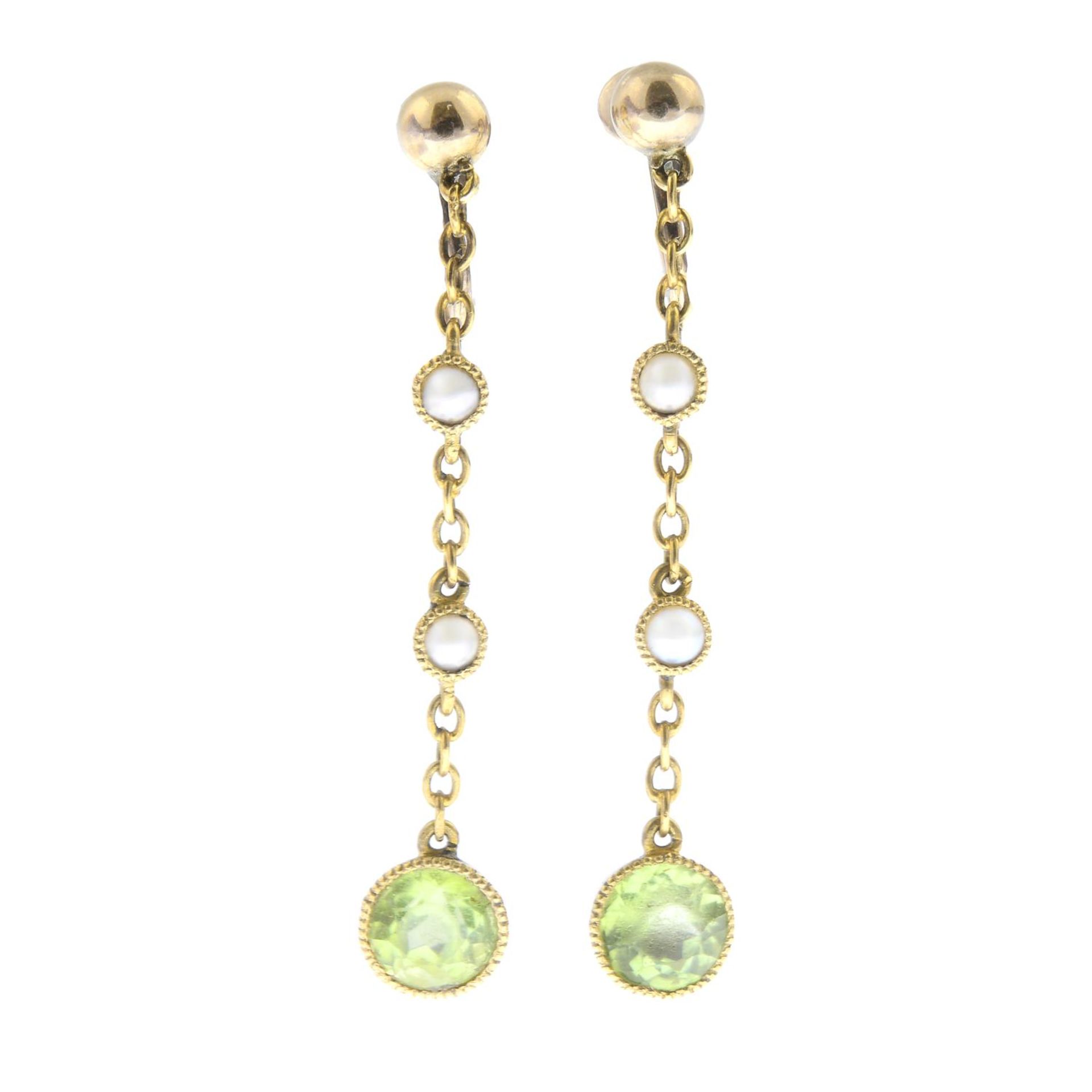 A pair of peridot and split pearl drop earrings.Stamped 15CT.