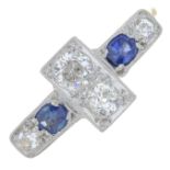 An early 20th century 18ct gold and platinum diamond and sapphire dress ring.Estimated total