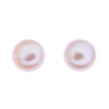 A pair of 18ct gold cultured pearl stud earrings.Cultured pearls measuring 5mms each.