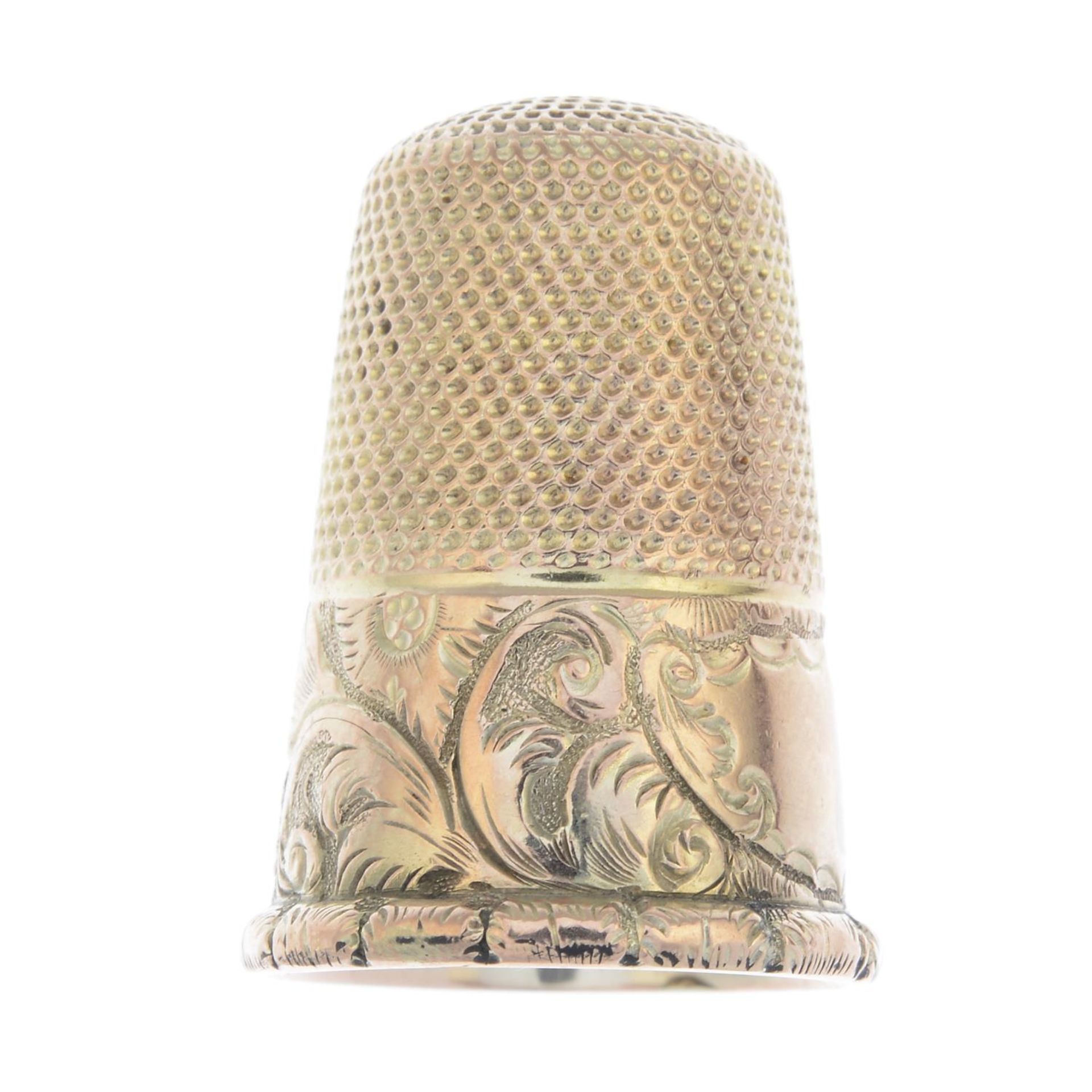 An early 20th century gold thimble.Length 2.3cms.