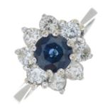 An 18ct gold sapphire and diamond cluster ring.Estimated total diamond weight 0.55ct.