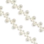 A set of cultured pearl jewellery, comprising a necklace and a bracelet.