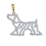 A 9ct gold diamond dog pendant.Estimated total diamond weight 0.50ct.