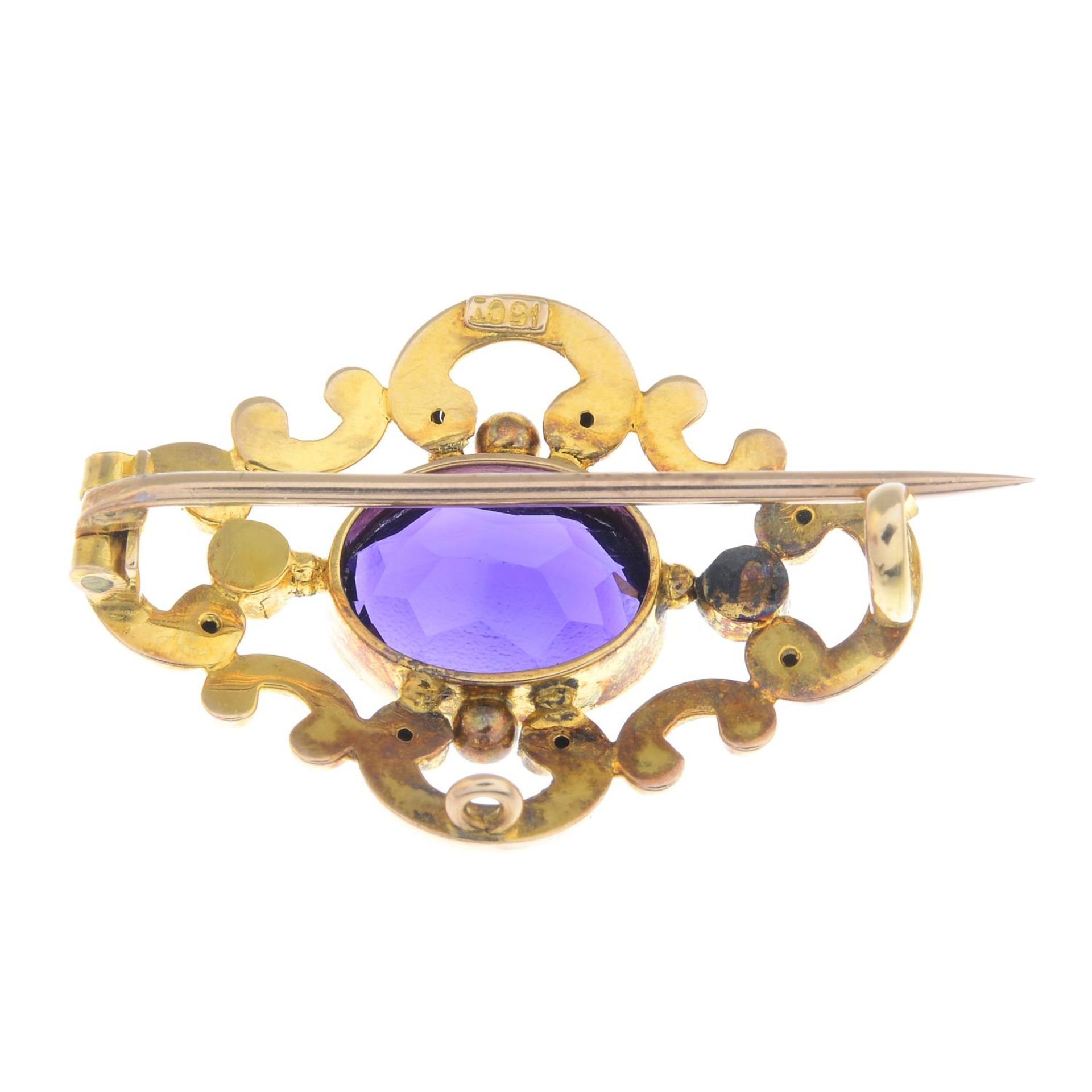 An early 20th century 15ct gold amethyst and split pearl openwork brooch.Stamped 15CT. - Image 2 of 2