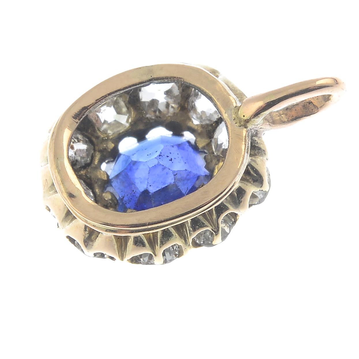 An early 20th century gold sapphire and old-cut diamond cluster pendant. - Image 2 of 2