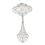 An early 20th century platinum and gold pearl and diamond openwork pendant,