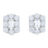 A pair of diamond cluster earrings.Estimated total diamond weight 1.40ct.
