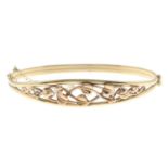 A 9ct gold 'Tree of Life' openwork bangle, by Clogau.