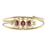 A garnet cuff bangle.Inner diameter 6.1cms.