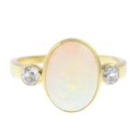 An opal and old-cut diamond three-stone ring.