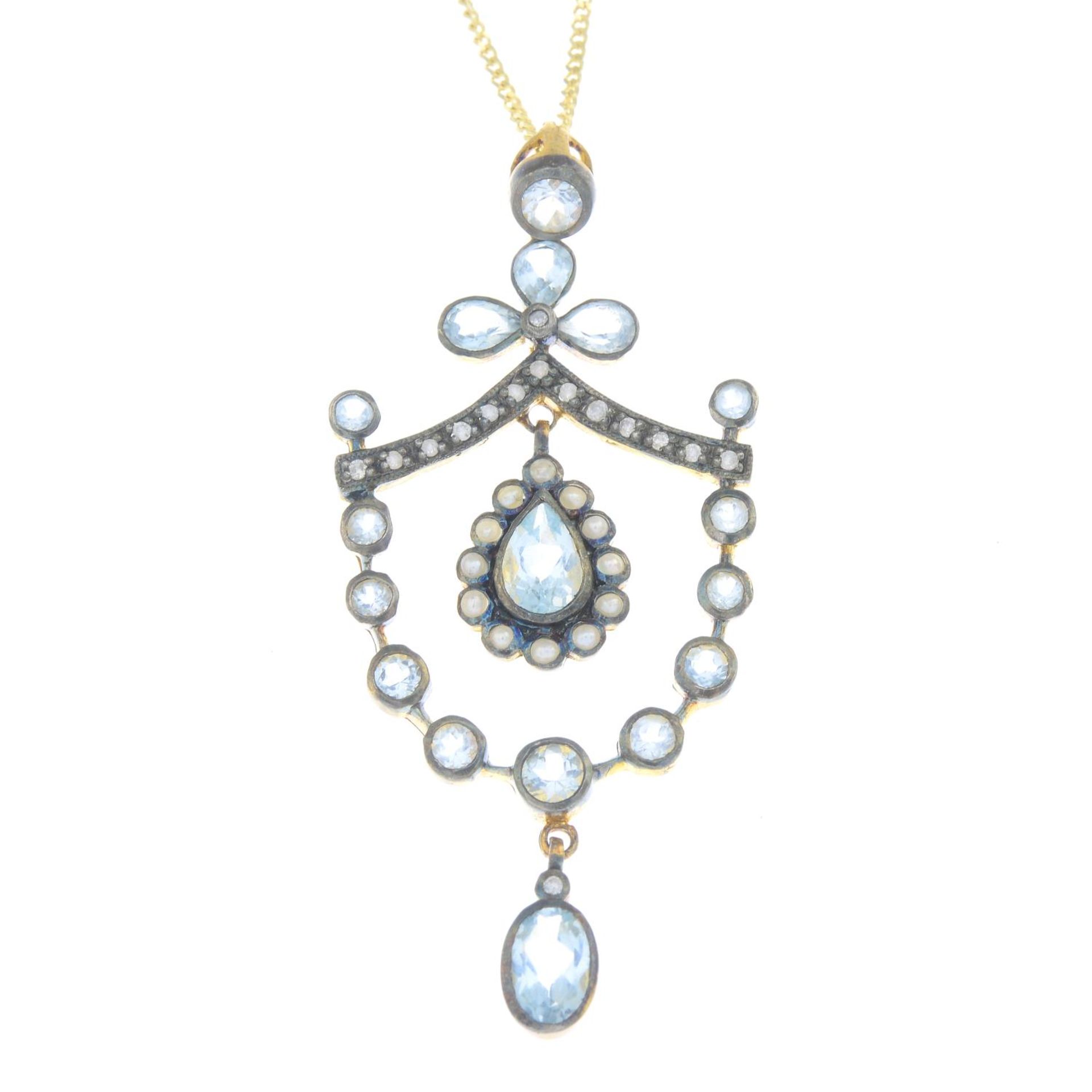 A blue topaz, diamond and seed pearl pendant,