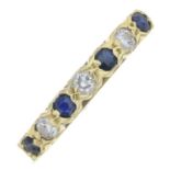 An 18ct gold diamond and sapphire ring.Estimated total diamond weight 0.10ct.