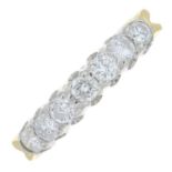 An 18ct gold diamond seven-stone ring.Estimated total diamond weight 0.70ct,