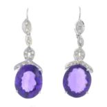 A pair of amethyst and diamond drop earrings.Amethyst calculated weight 5.76 and 7.79cts,