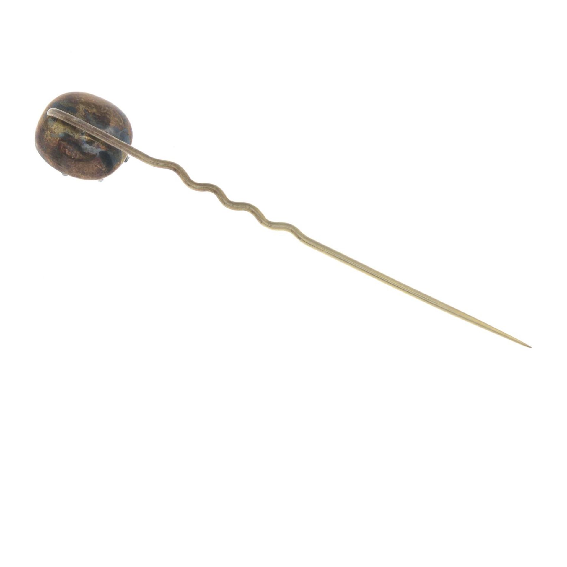 A mid 19th century foil-back rock crystal stickpin.Length of stickpin head 1.2cms. - Bild 2 aus 2
