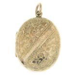 A locket, with engraved clover detail.Length 4cms.