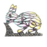 A ruby, pyrite and plique-a-jour brooch, depicting a rabbit.