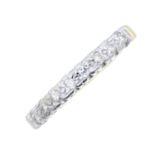 An 18ct gold diamond half eternity ring.Estimated total diamond weight 0.15ct.