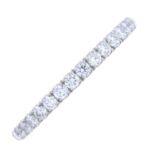 A platinum diamond half eternity ring.Estimated total diamond weight 0.45ct.