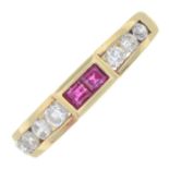 A brilliant-cut diamond and ruby half eternity ring.Total diamond weight 0.38ct, stamped to band.