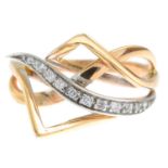 An 18ct gold diamond bi-colour dress ring.Hallmarks for 18ct gold.