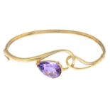 A 9ct gold amethyst bangle.Hallmarks for 9ct gold.