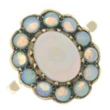 A 9ct gold opal cluster ring.Hallmarks for 9ct gold.