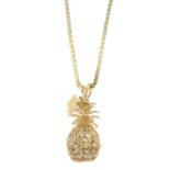 A pineapple openwork pendant, with box-link chain.Stamped 14K.