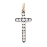 An early 20th century silver and gold diamond cross pendant.