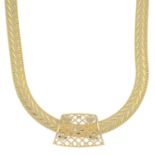 A lattice pendant, slide on the textured chain.Stamped 14K 585.