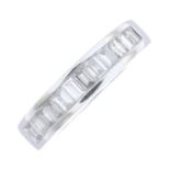 A diamond half eternity ring.Total diamond weight 0.60ct, stamped to band.