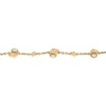 A bracelet, designed as a series of alternating conches,