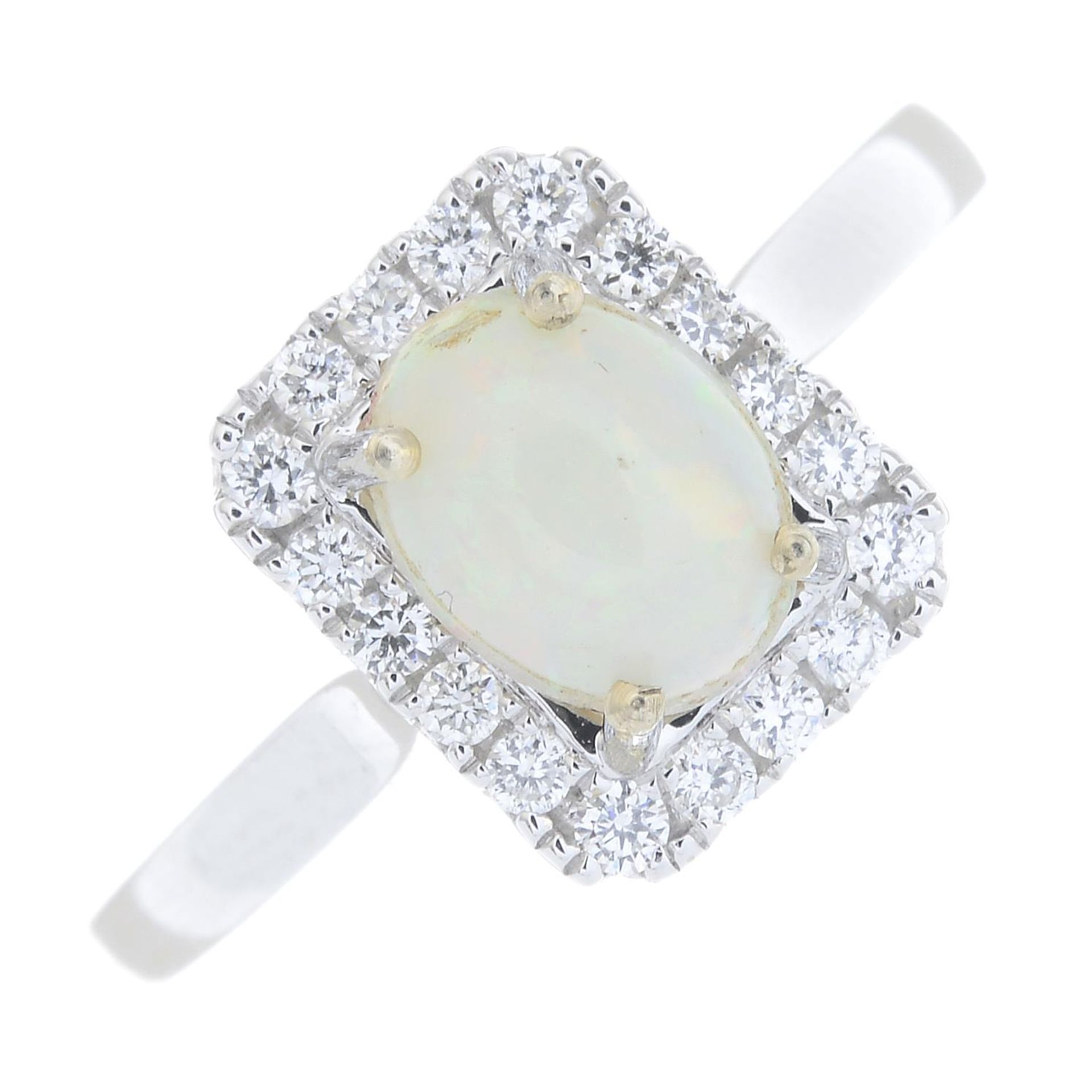 An opal and diamond cluster ring.Estimated total diamond weight 0.15ct.
