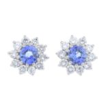 A pair of sapphire and brilliant-cut diamond cluster earrings.