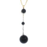 An onyx and seed pearl drop pendant,