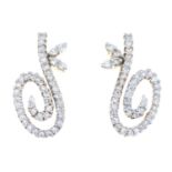 A pair of diamond earrings.Total diamond weight 0.75ct, stamped to mount.