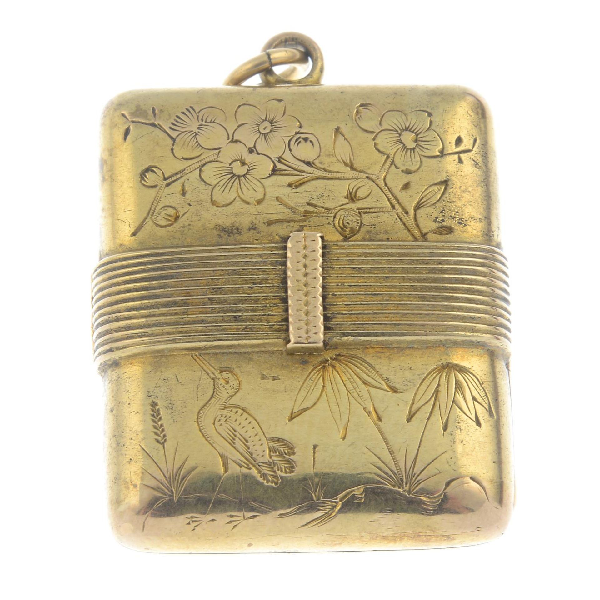 An early 20th century locket, with floral and bird motif.Length 3.4cms.