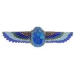 An Egyptian revival enamel brooch, with paste scarab beetle highlight.Length 7.4cms.