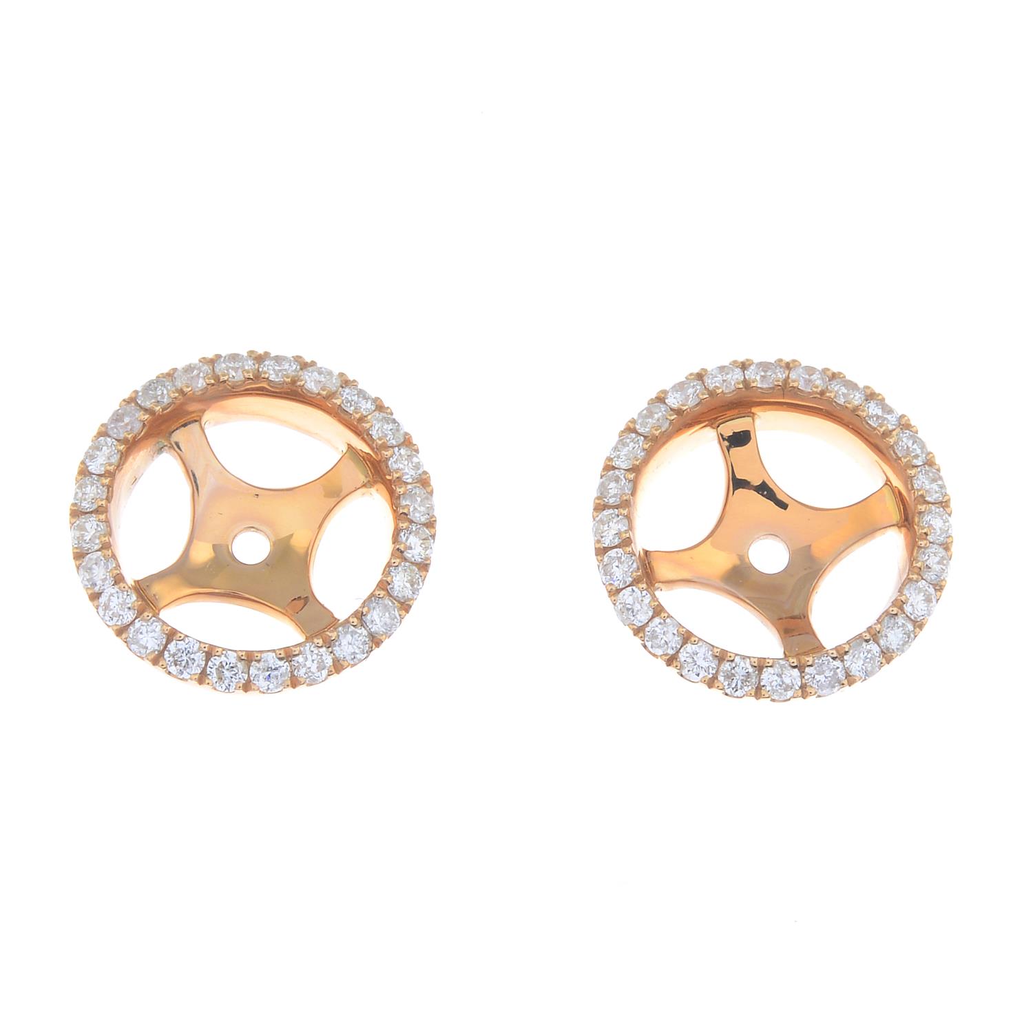 A pair of 18ct gold diamond stud earring jackets.Estimated total diamond weight 0.35ct.