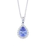 A sapphire and diamond cluster pendant, with 18ct gold chain.Sapphire weight 1.14cts.