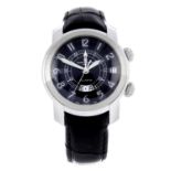 BAUME & MERCIER - a limited edition gentleman's Capeland GMT Alarm wrist watch.