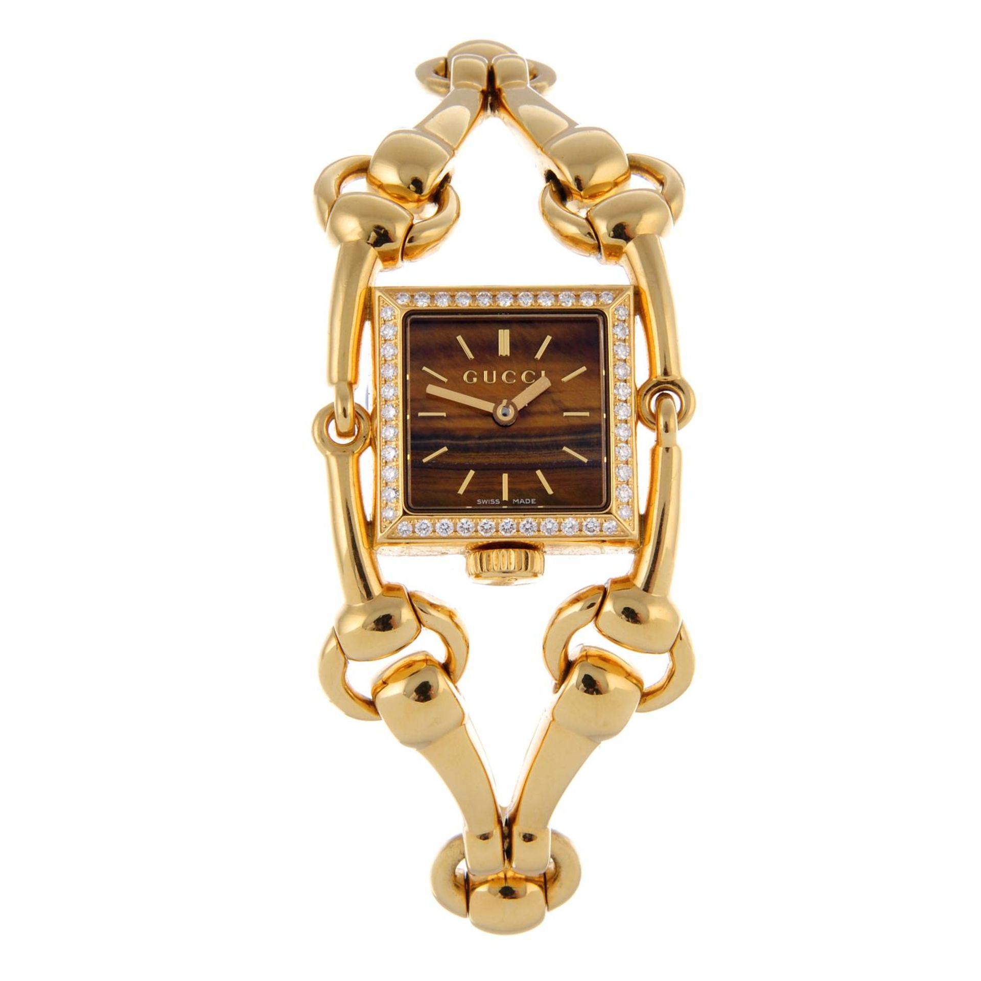 GUCCI - a lady's Signoria bangle watch.