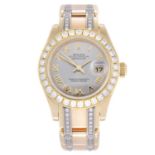 ROLEX - a lady's Oyster Perpetual Datejust Pearlmaster bracelet watch.