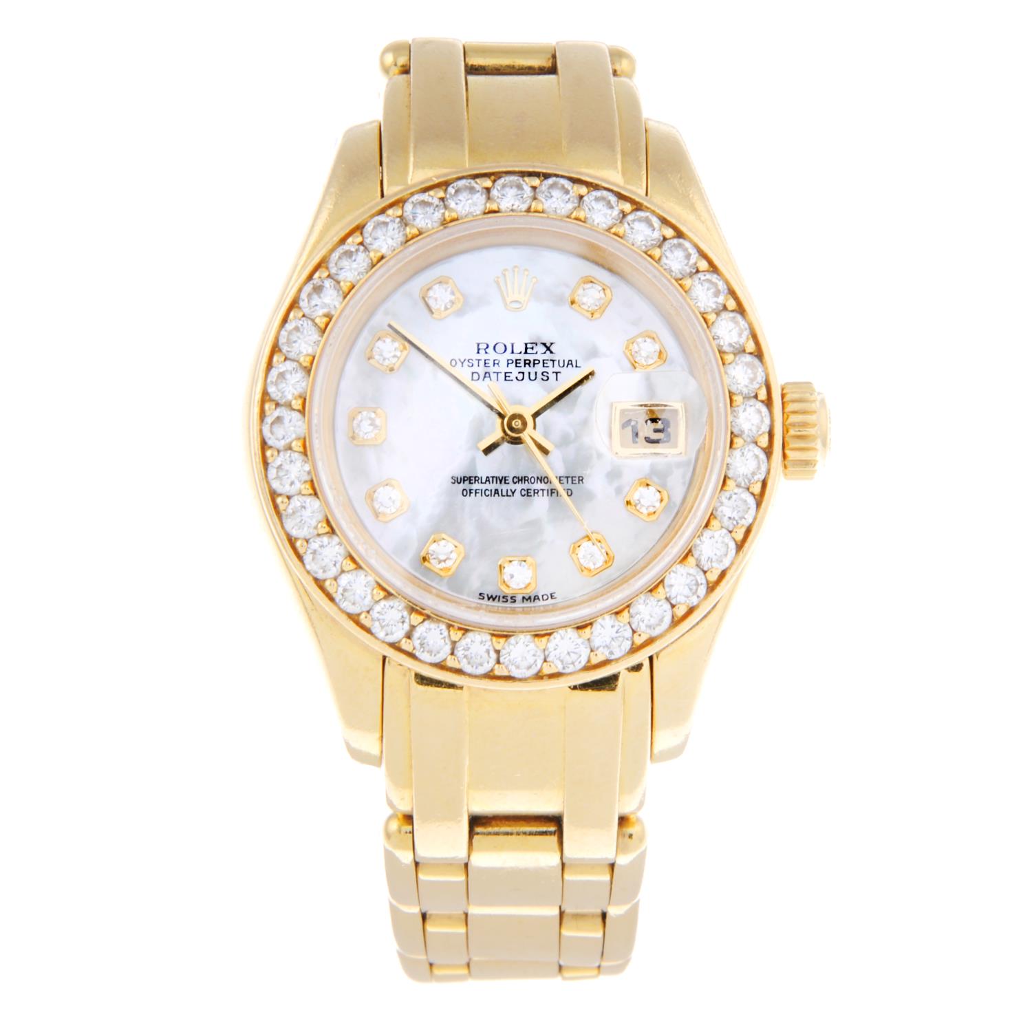 ROLEX - a lady's Oyster Perpetual Datejust Pearlmaster bracelet watch.